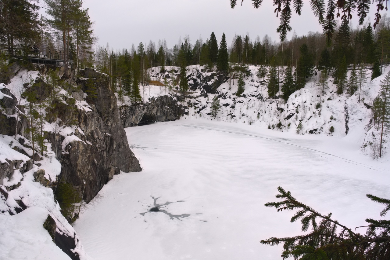 The path and the holes in the ice of the Marble Canyon